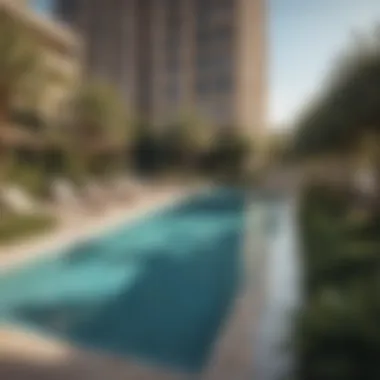 Inviting outdoor pool area surrounded by lush landscaping